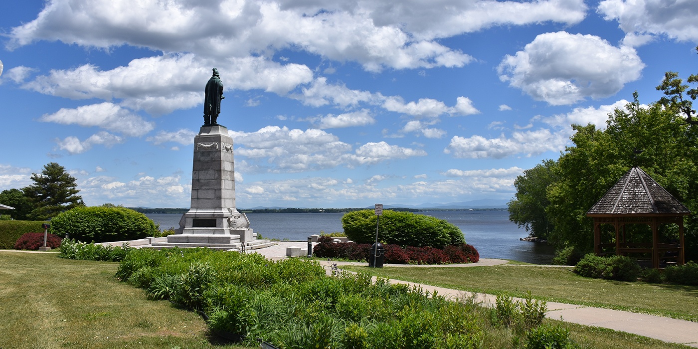 Plattsburgh lake and statue