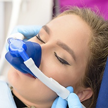 woman with nitrous oxide mask on